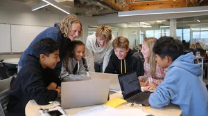 a-diverse-group-of-students-engaged-in-a-collabora.png